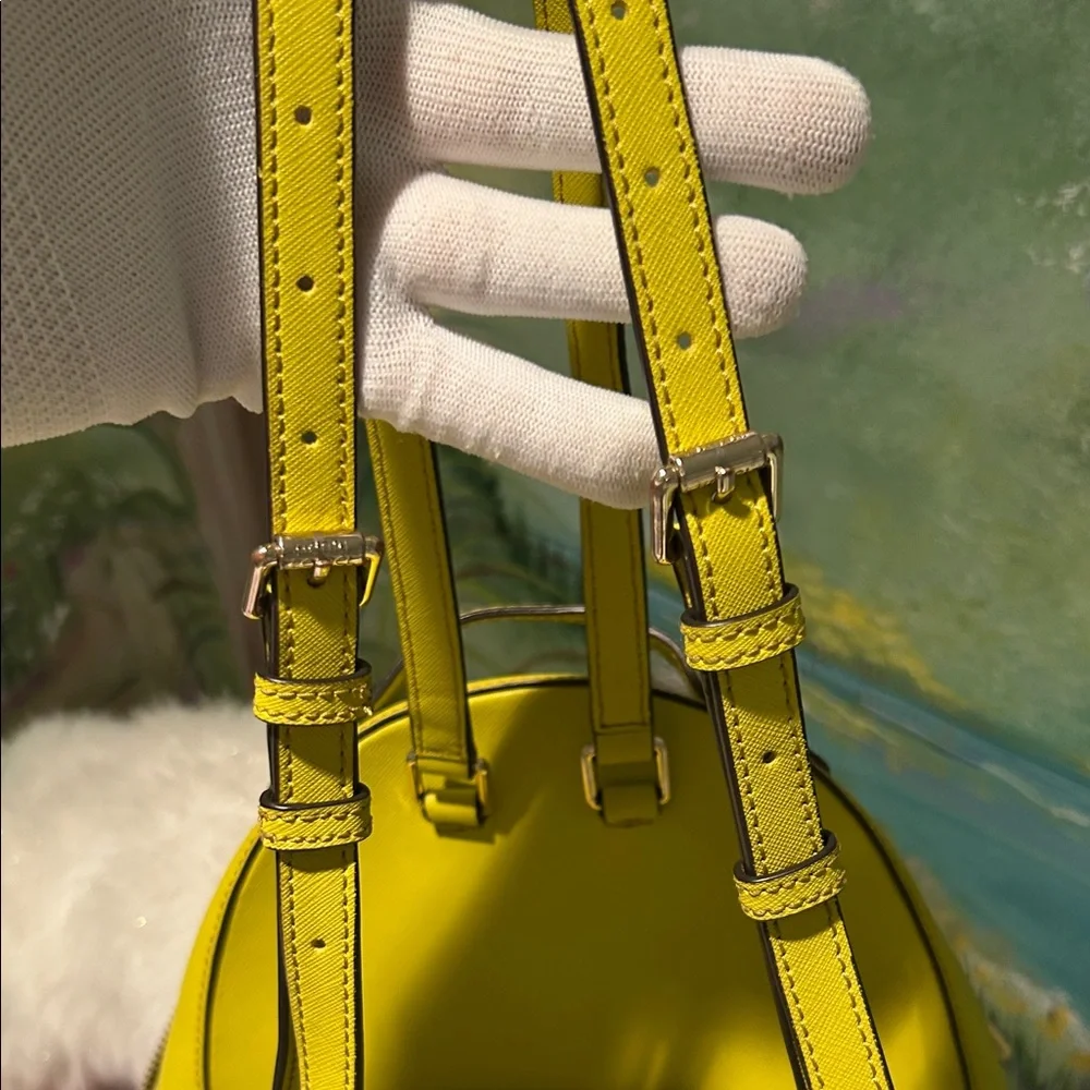 Henri Bendel West 57th Yellow Saffiano Leather Backpack with Colorful Tassels